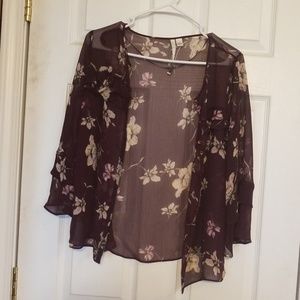 I am selling a beautiful dress shirt with flowers